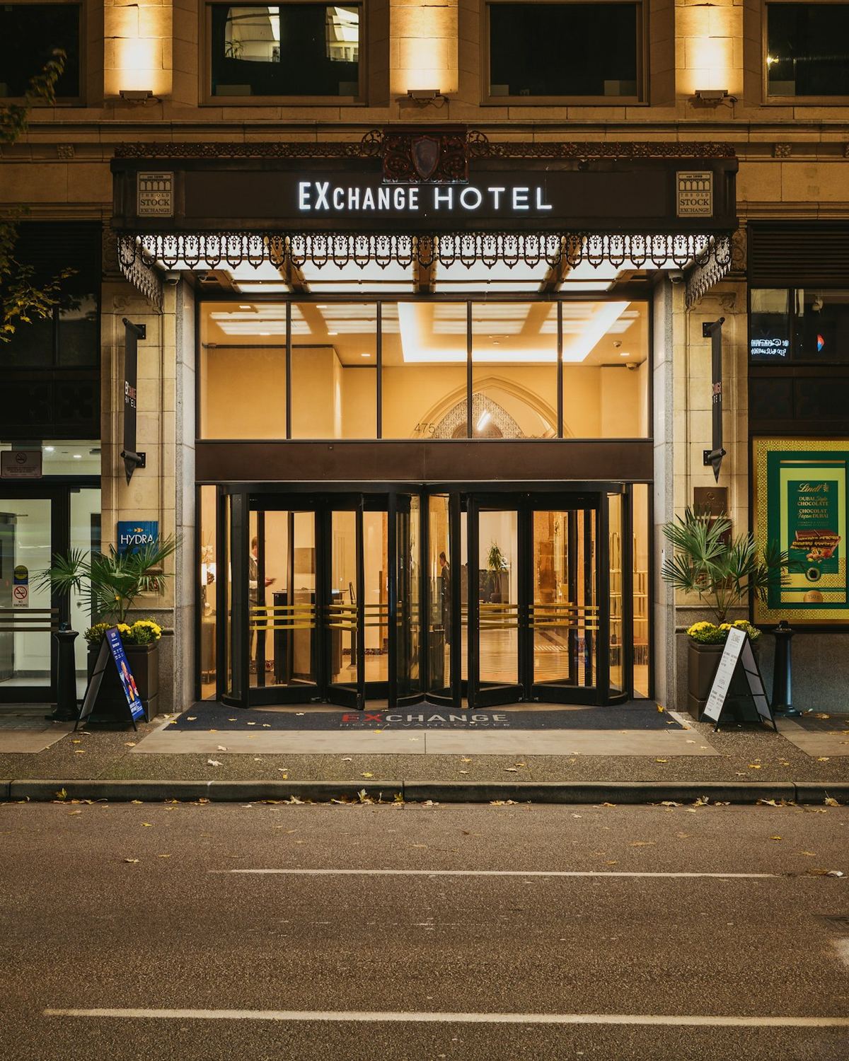 Elegant hotel entrance glowing at night